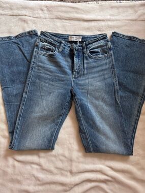 Women’s size 24x30 Flying Monkey Blue Mid-Rise Bootcut Denim. Never worn